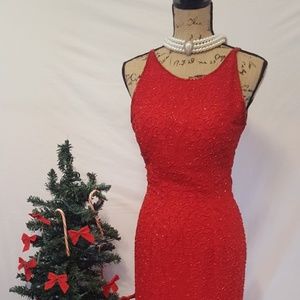 Long red beaded formal gown